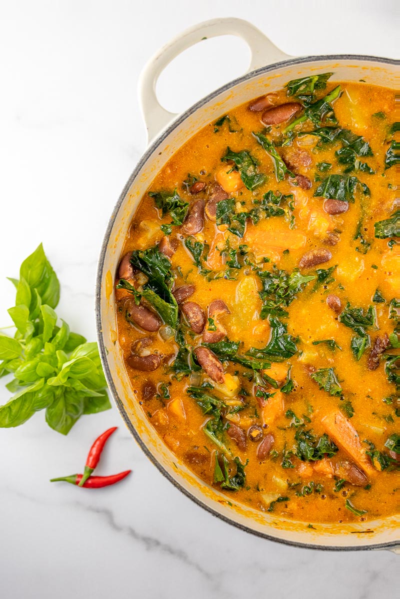 Vegan Panang Curry Soup with Kale, Beans + Sweet Potato